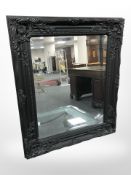 A Victorian style ebonised wall mirror, 62cm x 53cm.