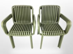 Six plastic stacking garden chairs