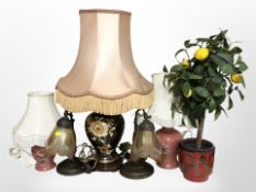 Two pairs of table lamps, a further ceramic lamp with tasseled shade and an artificial plant in pot,