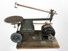 A vintage Hobbies tabletop saw.