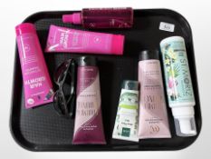 A group of new retail stock items, to include: Tanning mouse, Charles Worthington shampoo,