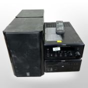 A Yamaha stereo receiver RX-E810 and further DVD player DVD-E810, a pair of Yamaha speakers, remote,