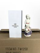 18 matching Old Tupton Ware pottery figures of girls in floral dresses, height 20.5cm, all boxed.