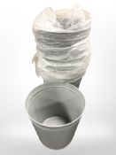 Eleven modern grey metal bins, height 28cm.