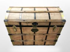 An early 20th century domed shipping trunk,