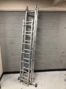 An aluminium extension ladder, and a further single ladder.