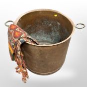 A 19th century twin-handled copper log bin,