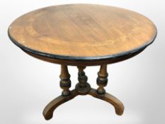A 19th century continental burr walnut and ebonised circular occasional table,