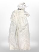 An antique christening gown and bonnet.