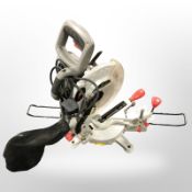 A 210mm compound mitre saw with laser.
