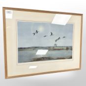 After Sir Peter Scott : Morning Flight Over The Wash, reproduction in colours, signed in pencil,