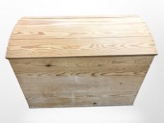 A modern pine dome topped trunk, width 68cm.