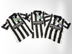 Three child's Newcastle United shirts, each size small. New with tags.