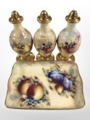 A Baron china shallow dish, width 16cm, and a further three sifters.