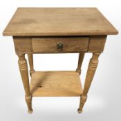 An early-20th century Scandinavian oak side table fitted a drawer, width 55cm.