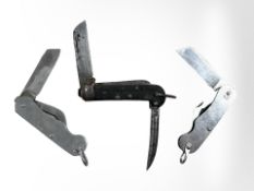 Three Army pocket knives, two British Army all steel, and one with chequered grips.