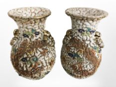 A pair of early-20th century Japanese Satsuma export earthenware textured vases, height 30cm.