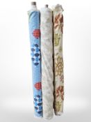 Three part rolls of upholsterer's fabric, approximate width 150cm, lengths unknown.