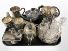 A silver plate and crystal five piece cruet set, further plated wares including ice bucket, teapots,