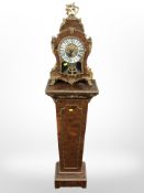 A reproduction Boulle-style bracket clock with gilt metal mounts, on matching pedestal,