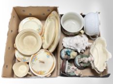 A large conch shell, two pottery basins, three Italian figures,