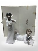 Two Nao figures of boys, No. 1285 and 1383, both with original boxes.