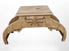 A walnut plant stand,