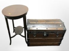 An early 20th century wooden bound trunk,