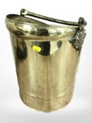A brass coal bucket, height 36cm.