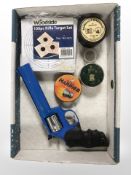 A die-cast metal CO2 .357 Magnum pistol, with a quantity of paper targets, three tins of .22 and .