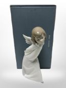 A Lladró figure 4960 'Curious Angel', with original box.