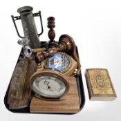 A pair of turned oak candlesticks, a further pair, a Metamec teak cased mantle timepiece,