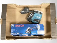 A Bosch angle grinder, together with a Makita sander.