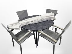 A circular metal garden table, diameter 110 cm,