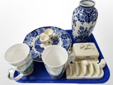 A Delft blue and white vase, further dish,