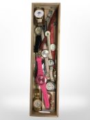 A slim wooden tray containing ladies and gents modern wristwatches, including Lorus, Claude Bernard,