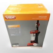 A Vax upright vacuum cleaner, still in retail packaging.