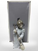 A Lladró figure 5726 'Sweep Away the Clouds', with original box.