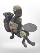 A cold painted bronze figure of a North African man, in the style of Bergmann, height 11cm.