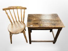 An 18th century joined oak table, width 68 cm,