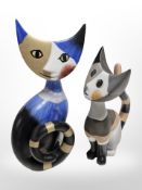 Two Goebel figures of seated cats, tallest 17 cm.
