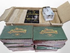 Eight boxes of Christmas lights and further box of new Diall LED bulbs