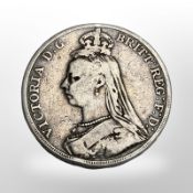 A Victorian 1889 silver crown.