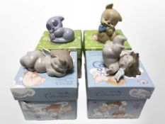 Four Nao Collections figures, all with original boxes.