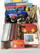 A group of toys and games, Broons annuals, Blue Peter, Just William books, etc.