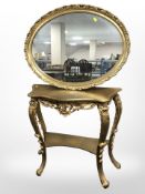 A reproduction gilt console table,