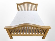 A contemporary oak 4'6 bed frame with iDream mattress