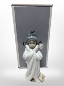 A Lladró figure 6800 'Bundled Bather', with original box.