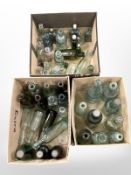 Three boxes containing antique and later glass bottles, advertising bottles etc.