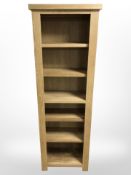 A modern oak open bookcase,